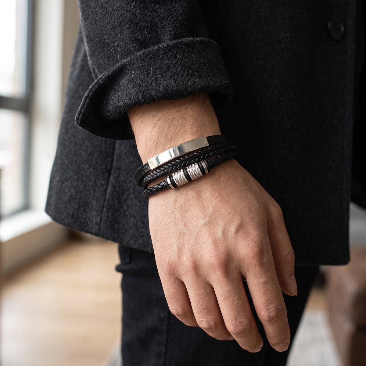 Braided leather bracelet worn on a man's wrist